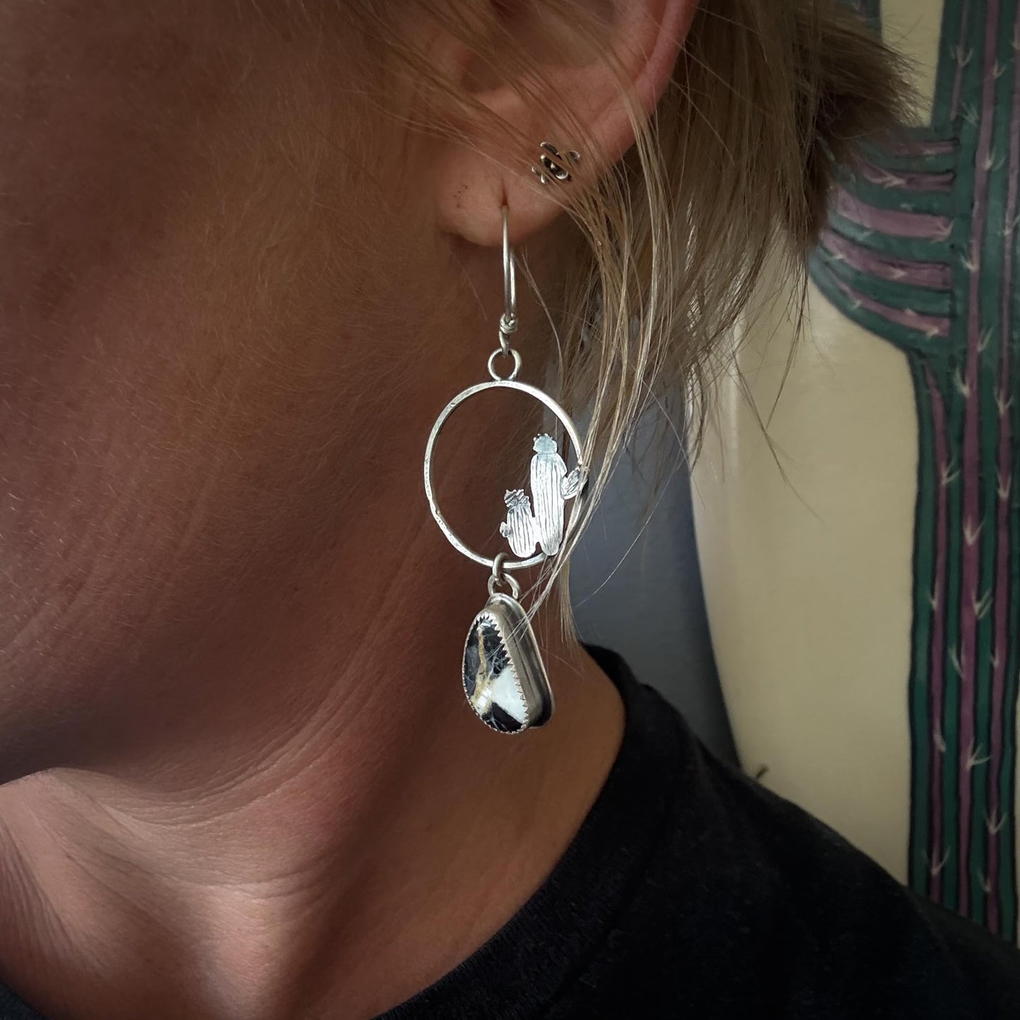 White Buffalo Turquoise Hoop Earrings in Sterling Silver with Hand-Sawn Cactus Design