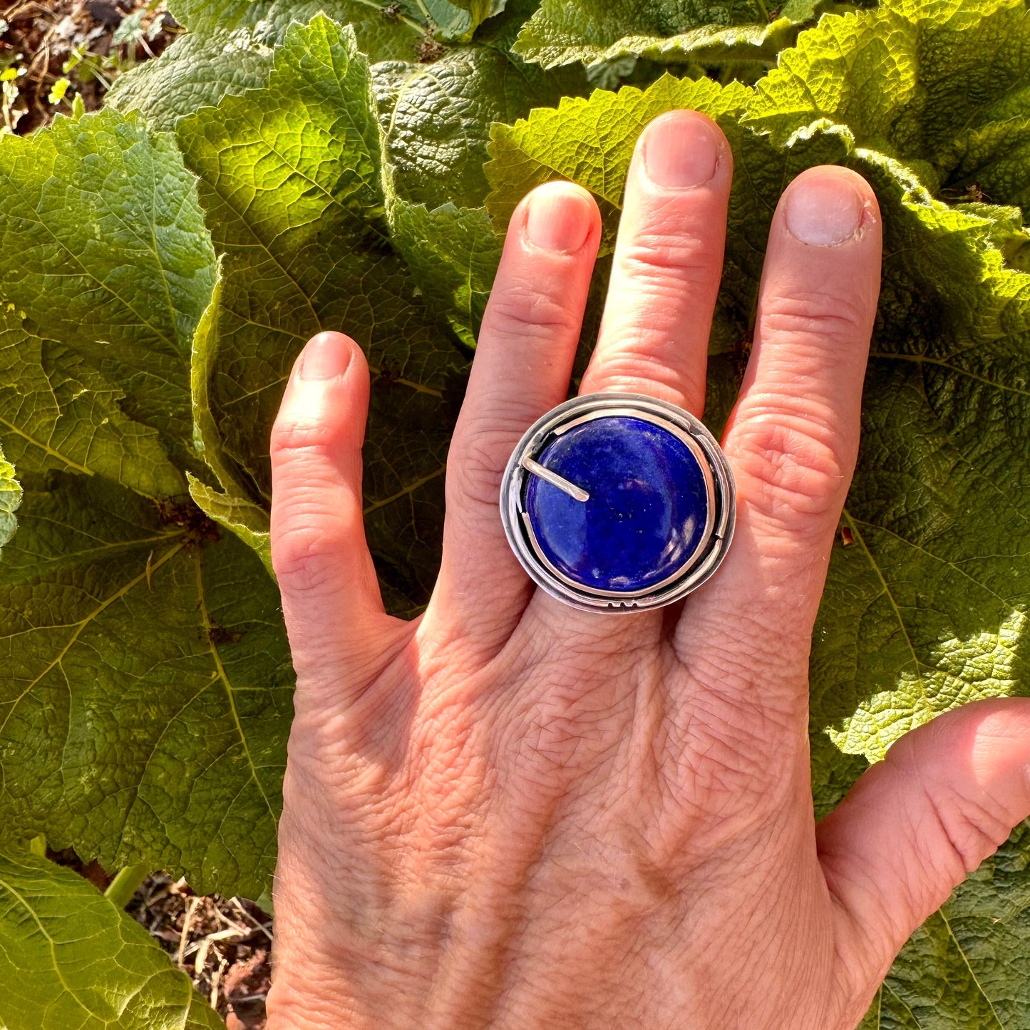 Deep Azure Majesty: Lapis Lazuli Wide-Band Statement Ring