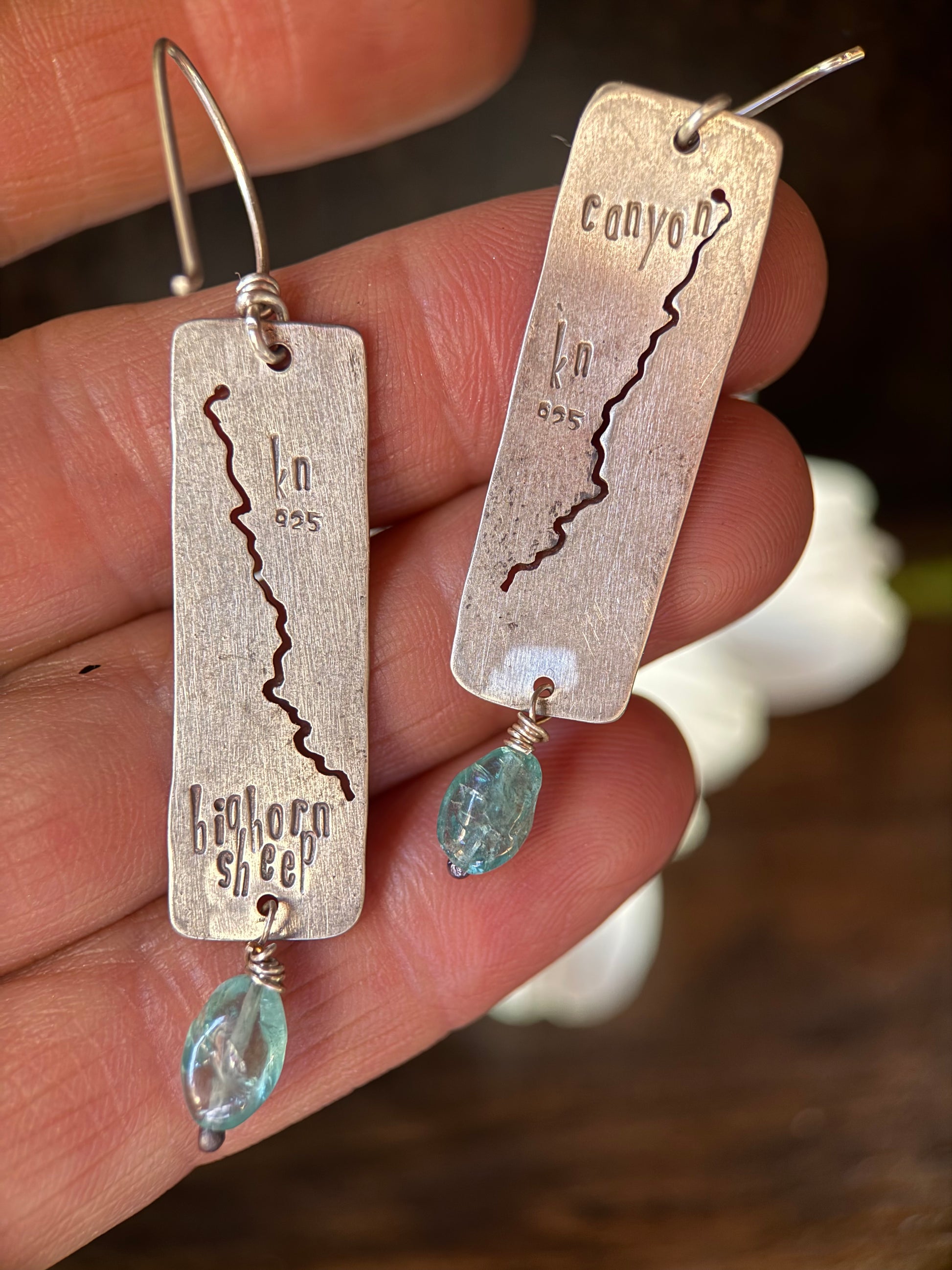 earrings with petite beads and Bighorn Sheep Canyon stamped on the back. The whitewater section is sawed out and shows through on both front and back. 