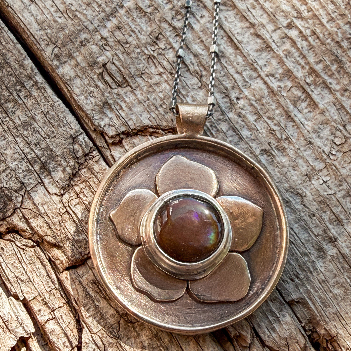 bronze flower necklace 1 1/4" around, Ethiopian opal set in sterling silver
