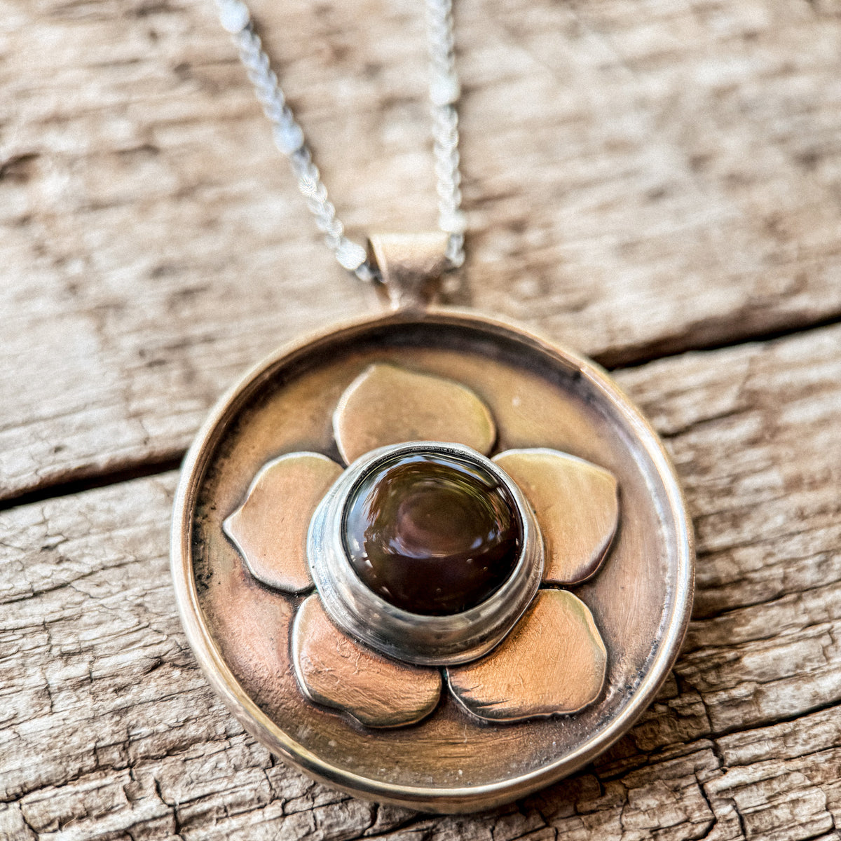 bronze flower necklace with opal set in sterling silver 