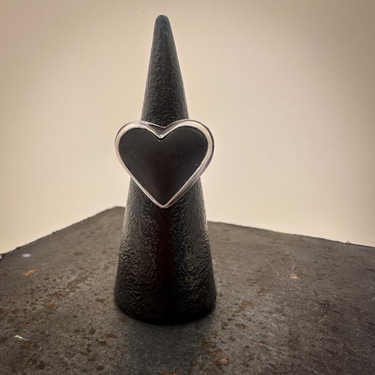 Black jade heart ring on adjustable sterling silver band – handmade by Mend Metalworks
