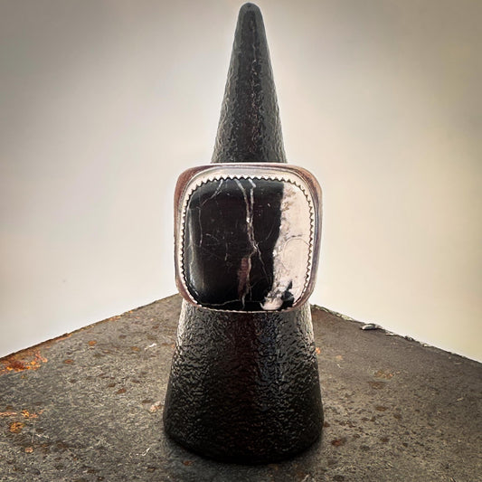Square white buffalo turquoise ring with black and white split stone in sterling silver – handmade by Mend Metalworks
