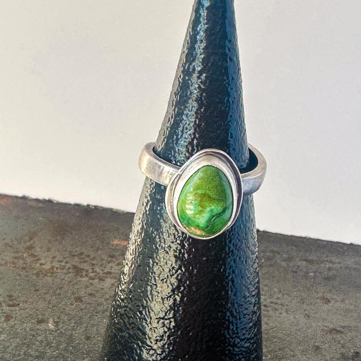 Green Sonoran Gold turquoise teardrop ring with adjustable sterling silver band – handmade by Mend Metalworks