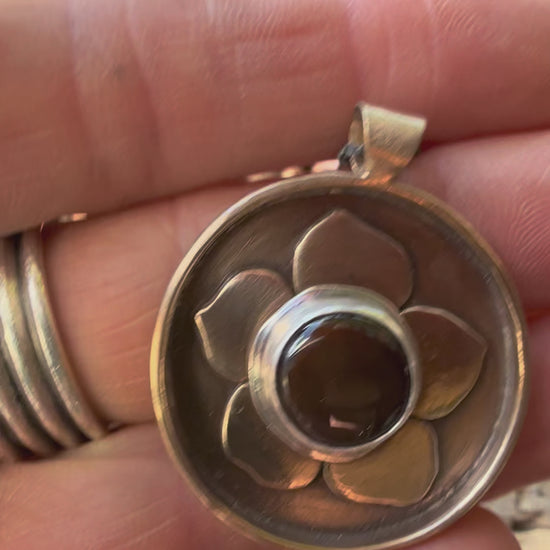 ancient bronze flower necklace with Ethiopian opal stone at the center in sterling silver
